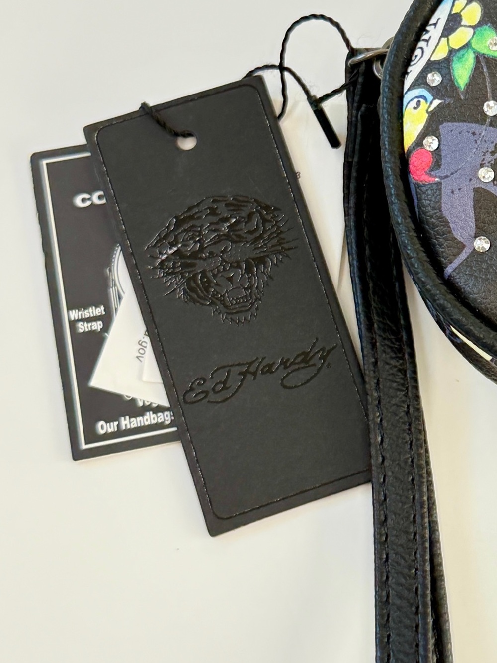 NWT Ed Hardy Black Round Tattoo Floral Wristlet with Red & Yellow Roses - Picture 2 of 4